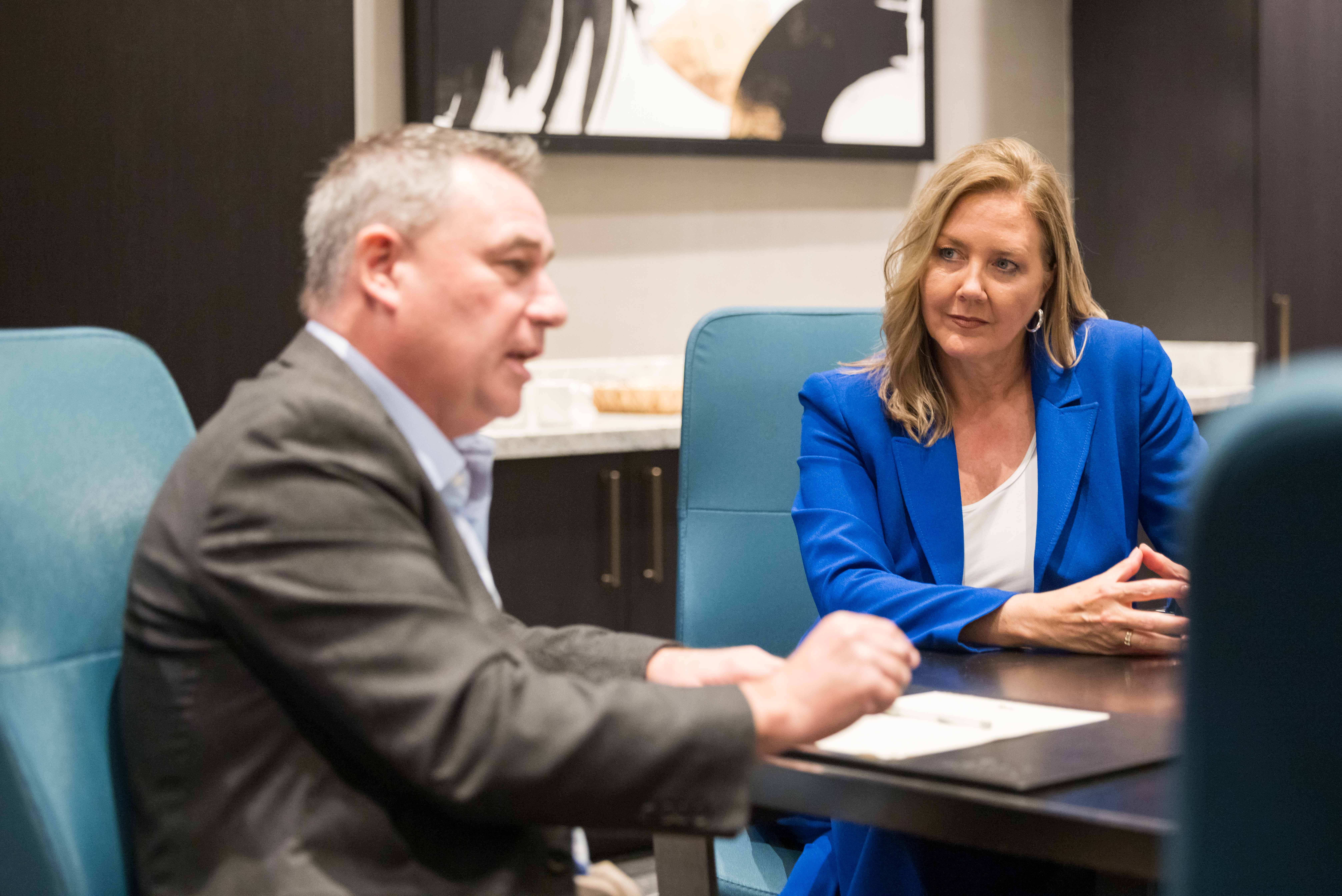 TeamSmile Executive Director John McCarthy (left) and Dentsply Sirona Chief Human Resources Officer and Executive Sponsor for Community Engagement Andrea Frohning discuss their partnership.